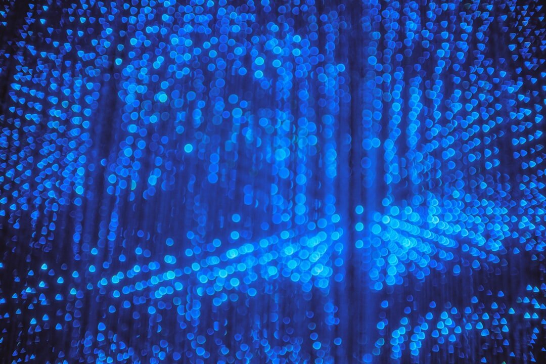 Abstract visualization of artificial intelligence neural network with glowing blue nodes