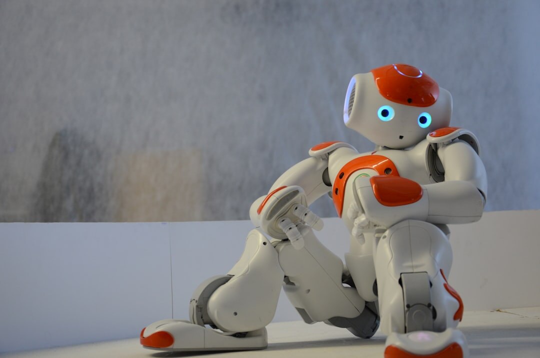 Modern white humanoid robot with smooth surface looking forward