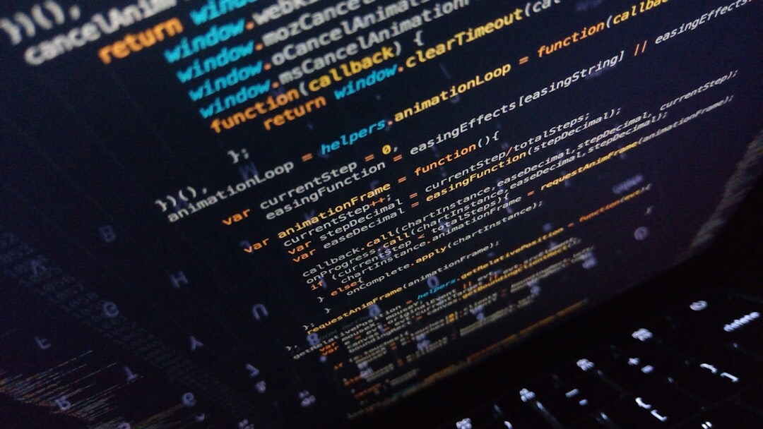 Computer screen showing colorful programming code in dark coding environment